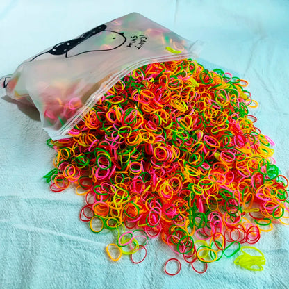 The Colorful Disposable Rubber Band Hair Ties – Bulk Packs for Kids & Styling