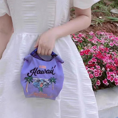 The Mini Embroidered Canvas Messenger Bag