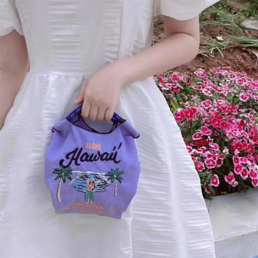 The Mini Embroidered Canvas Messenger Bag