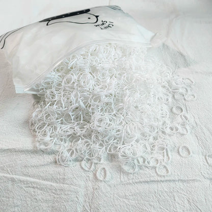 The Colorful Disposable Rubber Band Hair Ties – Bulk Packs for Kids & Styling