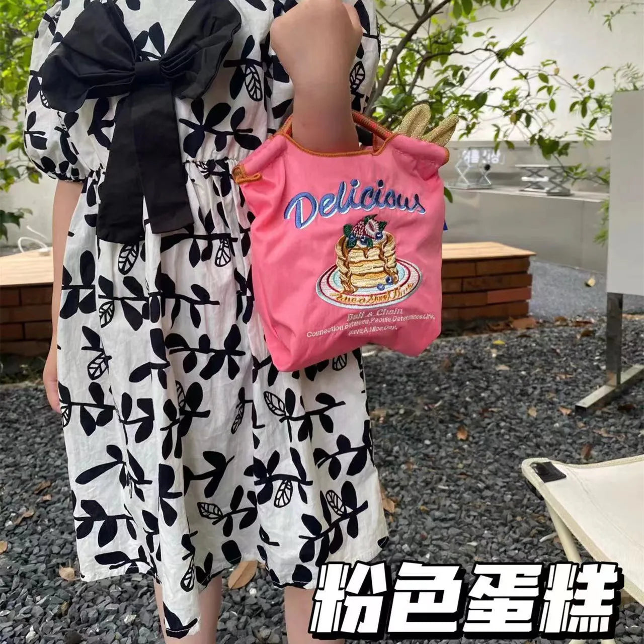 The Mini Embroidered Canvas Messenger Bag