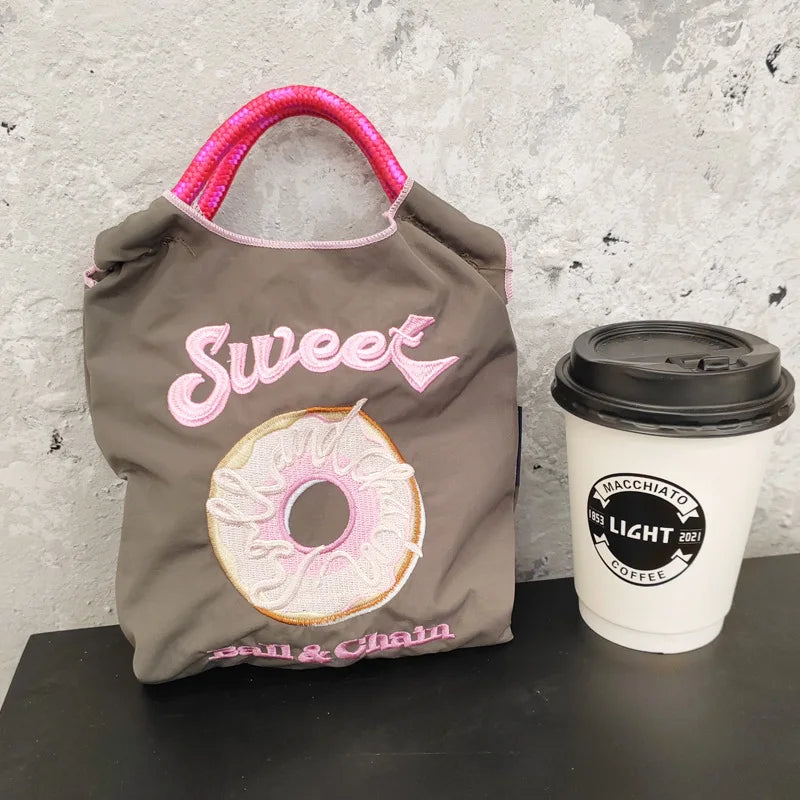 The Mini Embroidered Canvas Messenger Bag