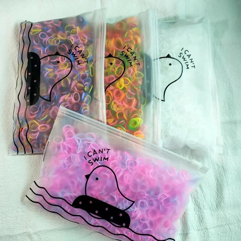 The Colorful Disposable Rubber Band Hair Ties – Bulk Packs for Kids & Styling