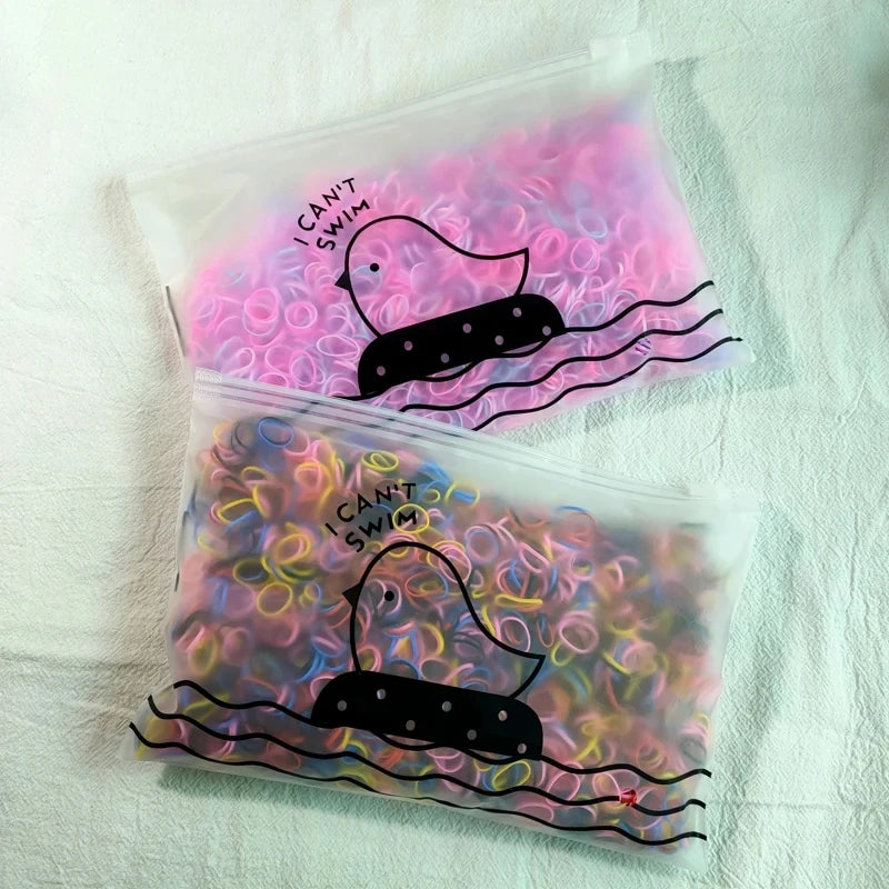 The Colorful Disposable Rubber Band Hair Ties – Bulk Packs for Kids & Styling