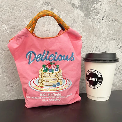 The Mini Embroidered Canvas Messenger Bag